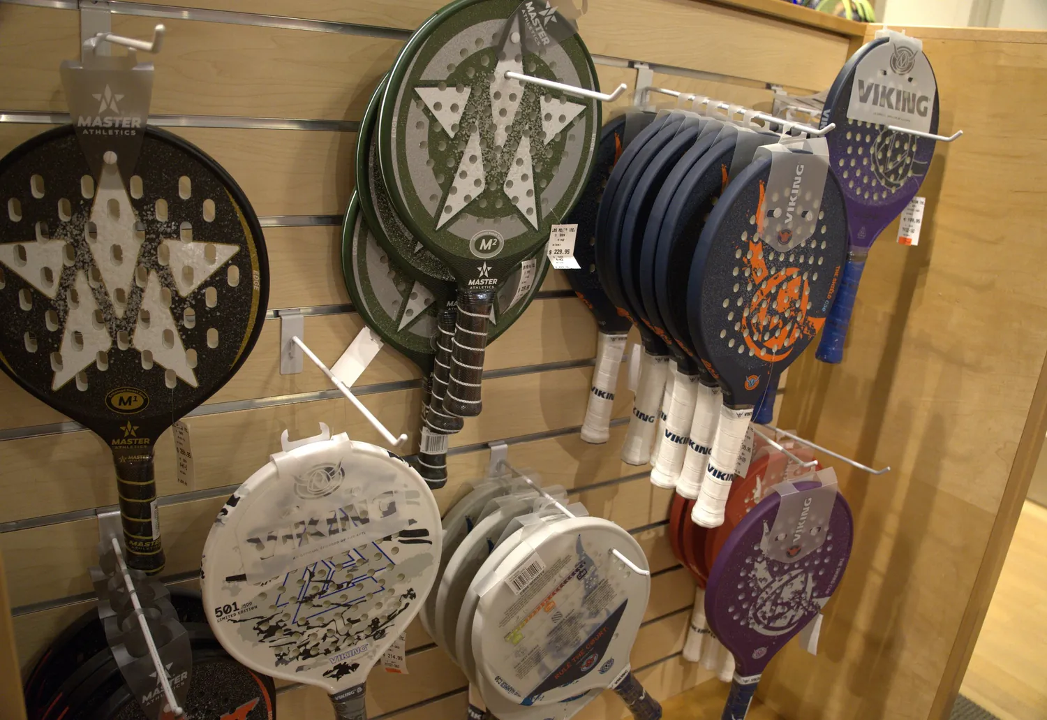 Master Athletics and Viking platform tennis paddles up close at the Mequon shop.