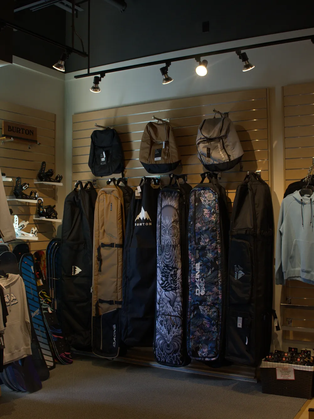 Men's snowboard outerwear and bags at the Mequon shop.