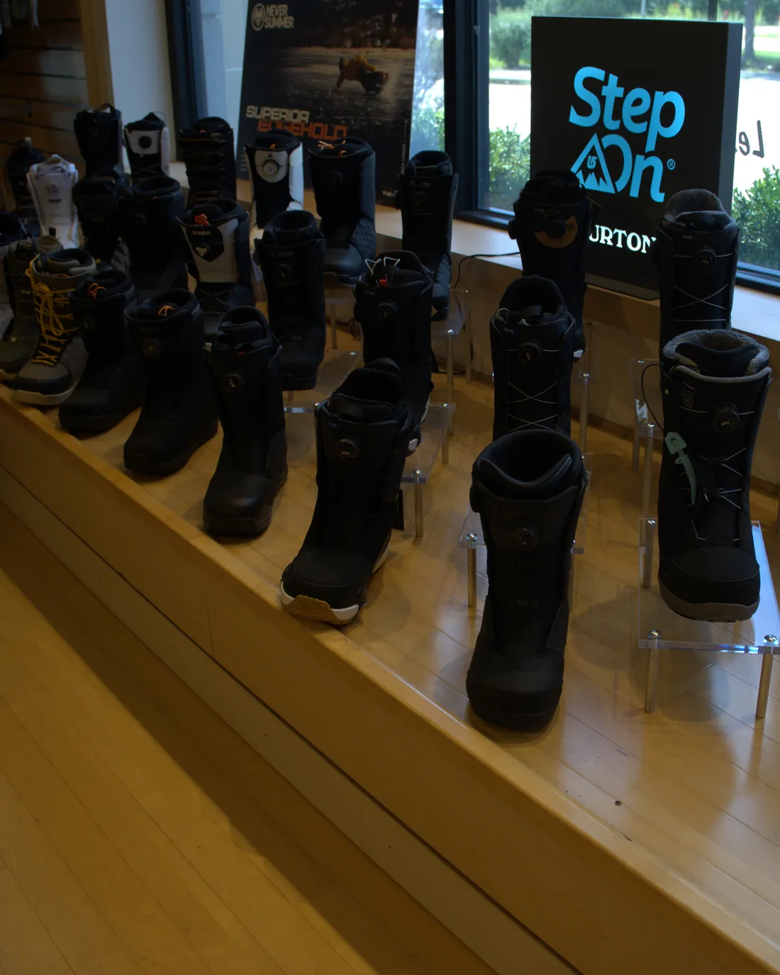 Snowboard boots lined up at the Mequon shop.