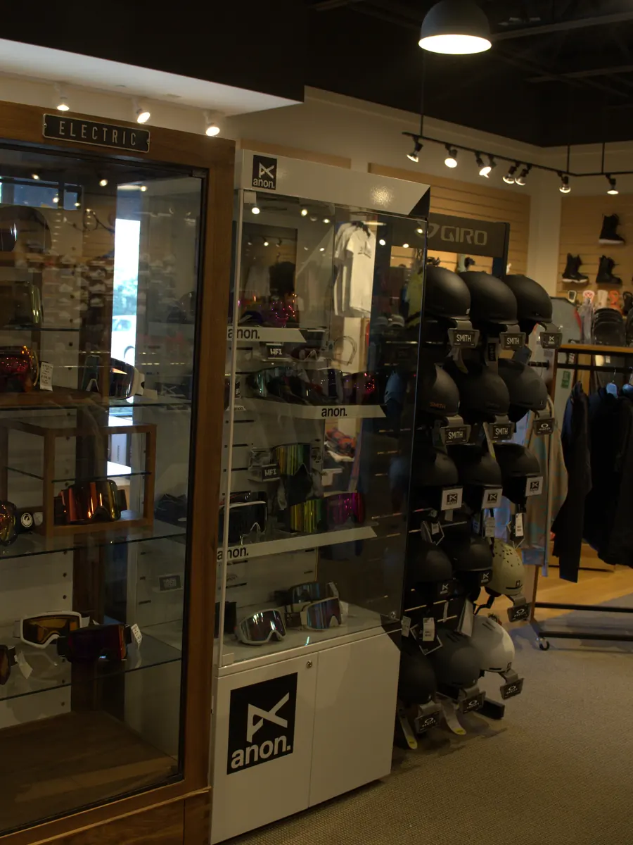 Goggles and accessories in the case at the Mequon shop.