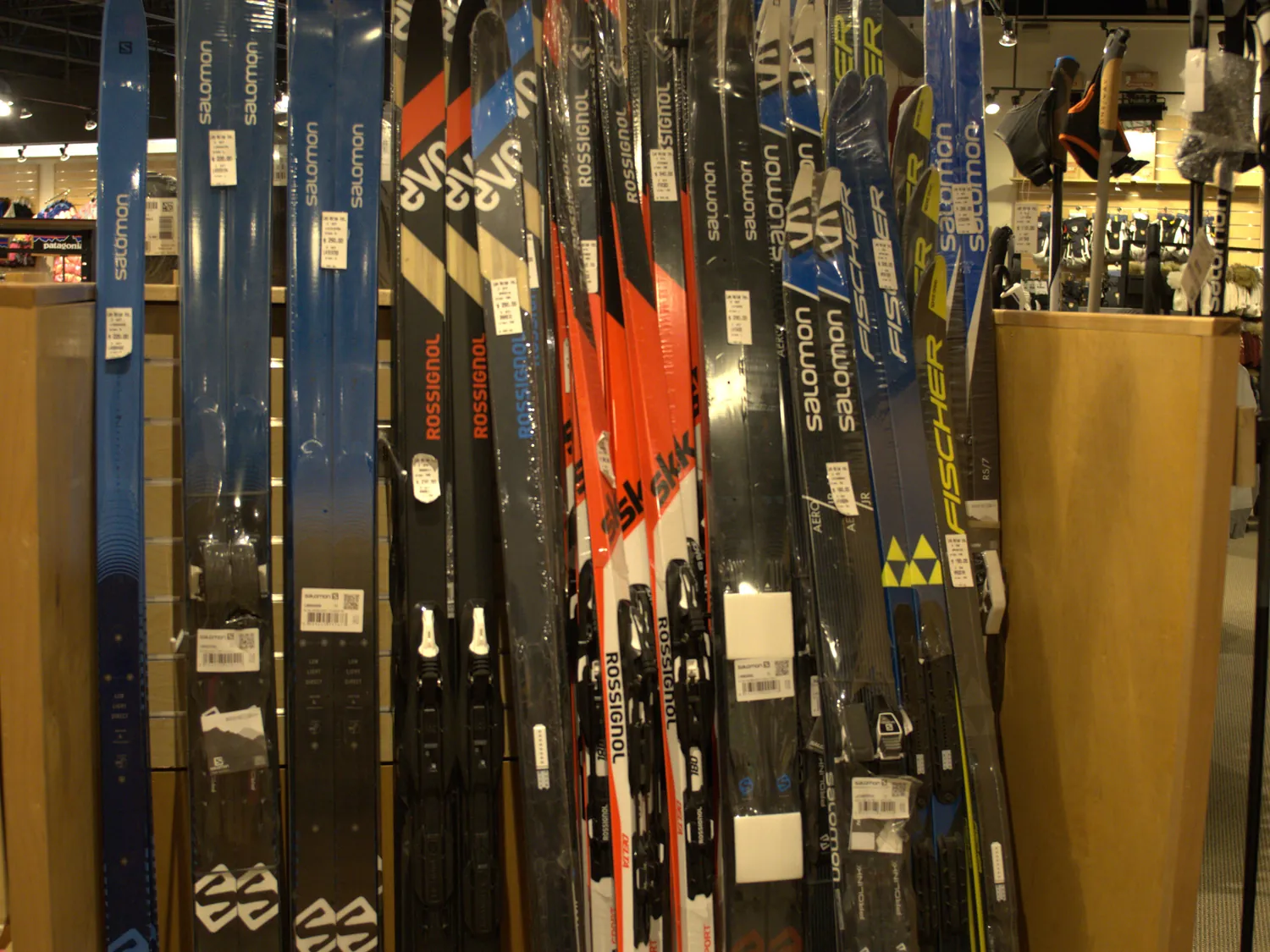Skis on the wall at the Mequon shop from Salomon, Fischer and Rossignol.