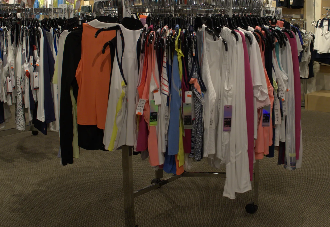 A clearance rack of marked-down tennis apparel at the Mequon shop.