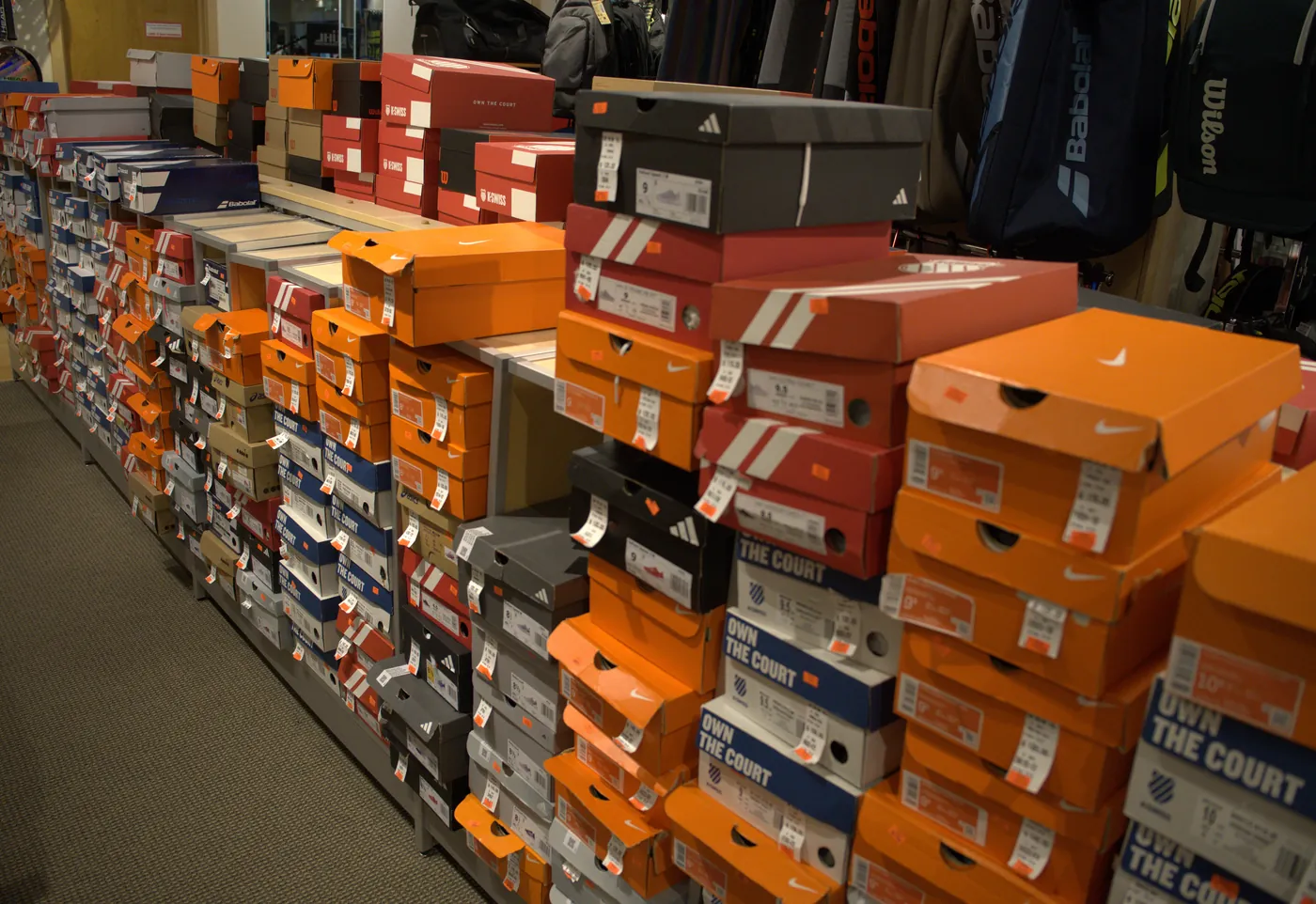 Clearance shoe boxes stacked at the Mequon shop.